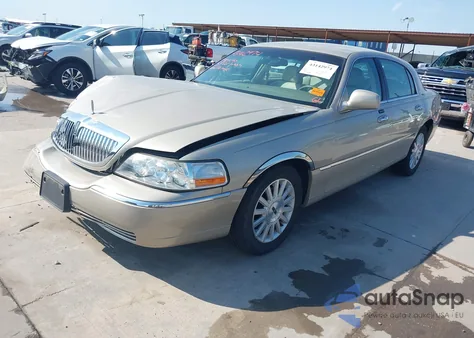 2004 Lincoln Town Car Signature из США, поврежденный, VIN 1LNHM81W44Y617901